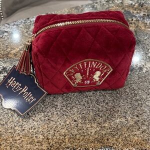 Harry Potter Gryffindor red velvet makeup bag with the house crest
